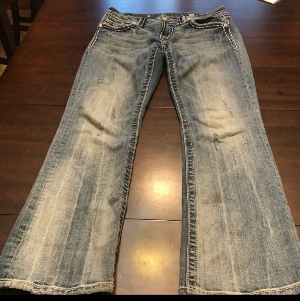 Miss Me jeans with some factory distress in front
